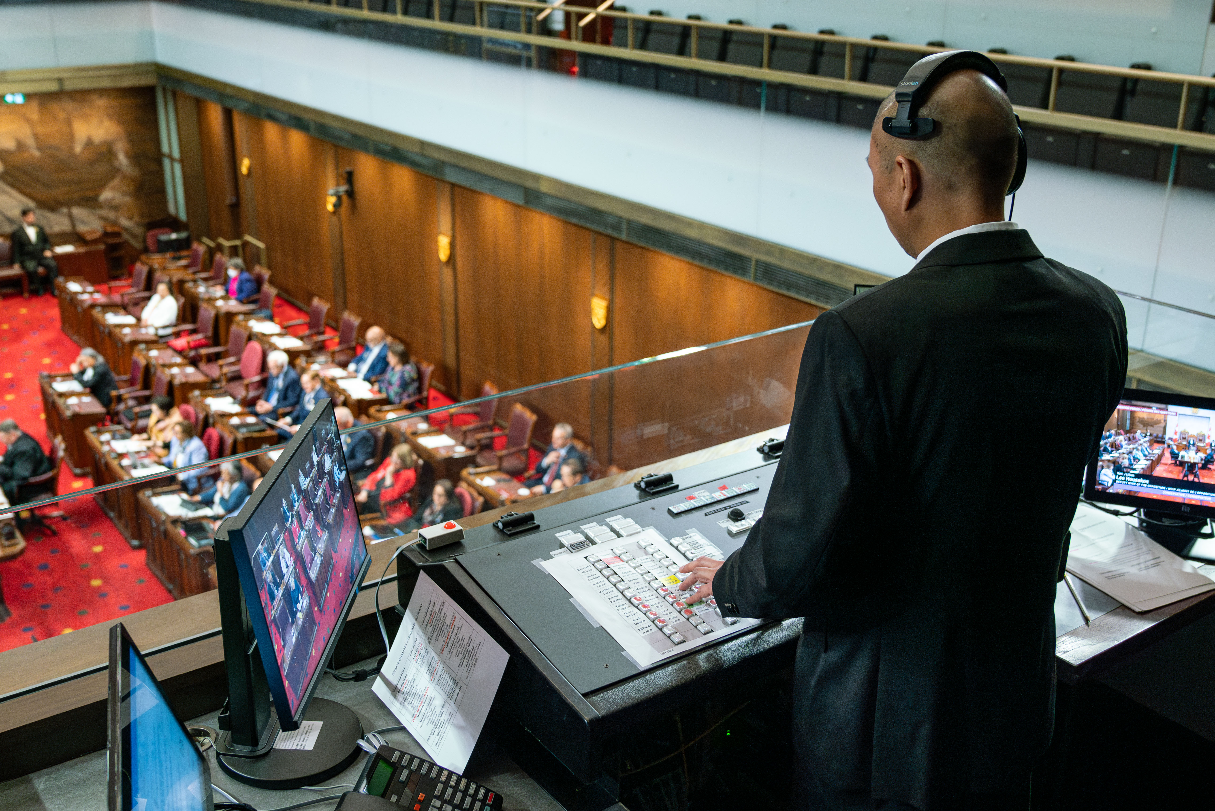 A console operator oversees a session of the Senate of Canada