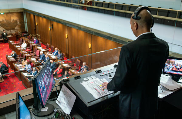 A console operator oversees a session of the Senate of Canada