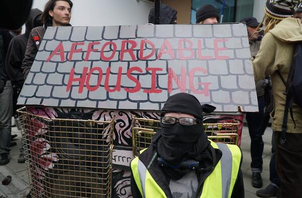 A group of activists protesting about inequality