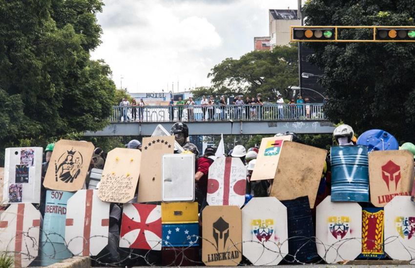  Members of the Opposition (or La Resistencia) in Caracas, Venezuela clash with security forces as they attempt to march to the Supreme Court on July 22, 2017