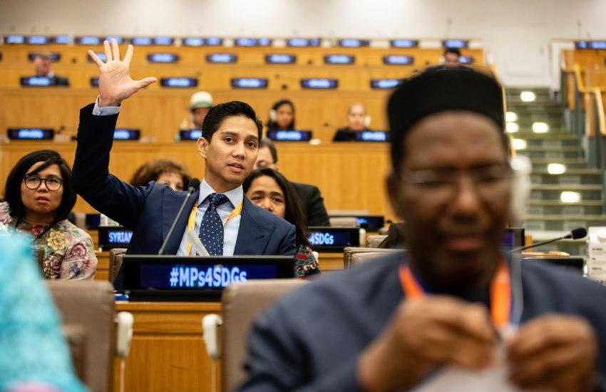 Delegate raising hand