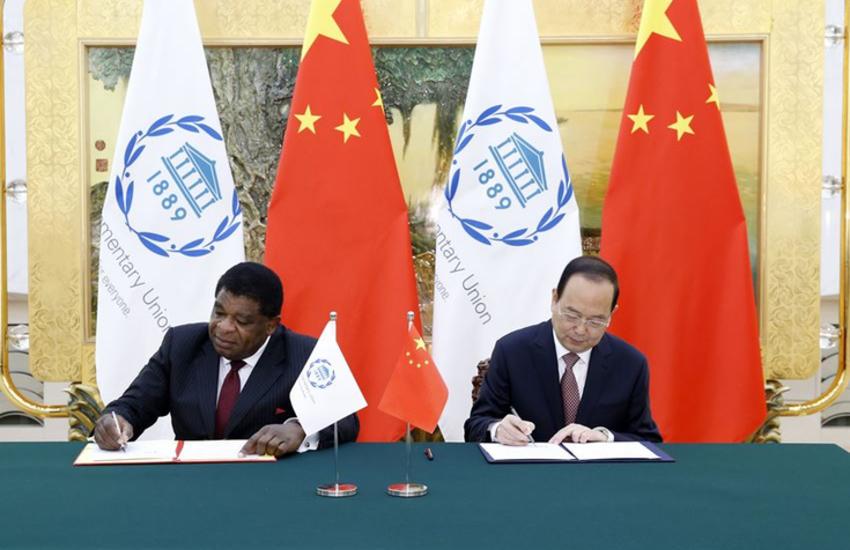 IPU Secretary General Martin Chungong and NPC Standing Committee Secretary General Yang Zhenwu signing the agreement on this donation.