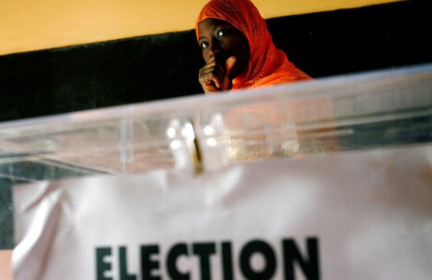 A Senegalese woman waits to cast her ballot at a voting station during presidential elections in the capital Dakar, February 25 2007