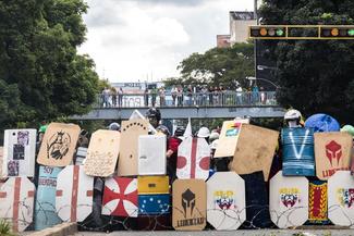  Members of the Opposition (or La Resistencia) in Caracas, Venezuela clash with security forces as they attempt to march to the Supreme Court on July 22, 2017