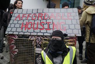 A group of activists protesting about inequality