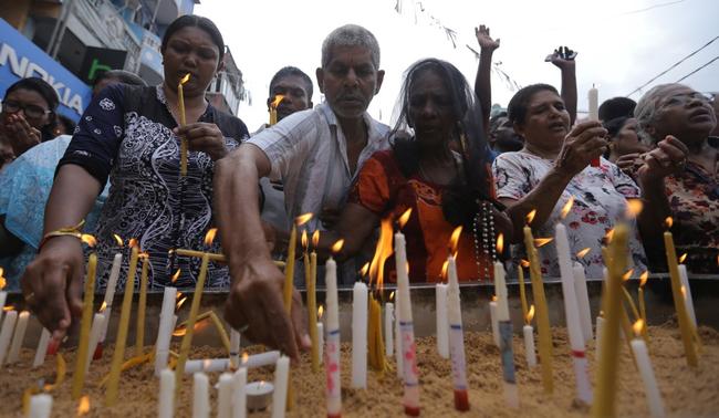 Sri Lankan Catholics after a bomb explosion