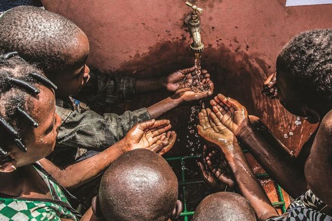 Children at a tap