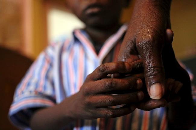 Les femmes, les enfants et les adolescents doivent affronter aujourd’hui des changements sociaux, économiques et culturels sans précédent. Photo: ©Reuters/Siphiwe Sibeko.