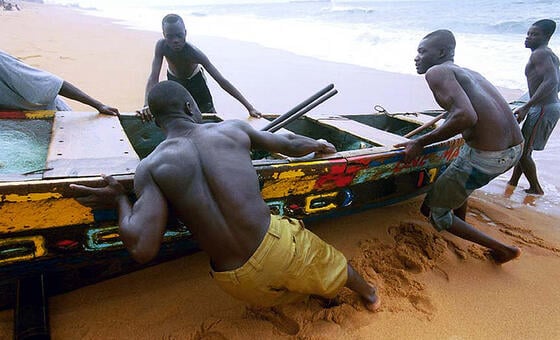 Fishermen with their boat