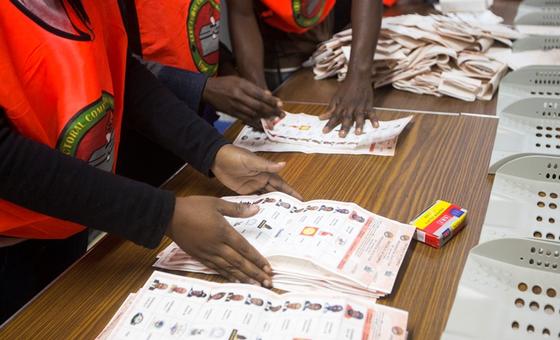 Election officials count ballot papers at a voting station in Lusaka, January 20, 2015